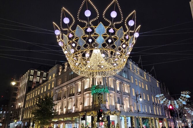An illuminated crown suspended over Regent Street as part of the Christmas lights display